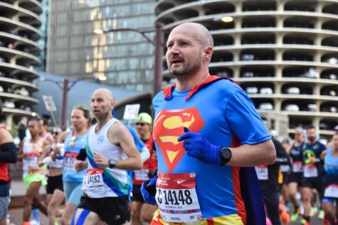 Its a bird! Its a plane! No, its runner Ian Sutherland dressed as Superman running the Chicago Marathon!