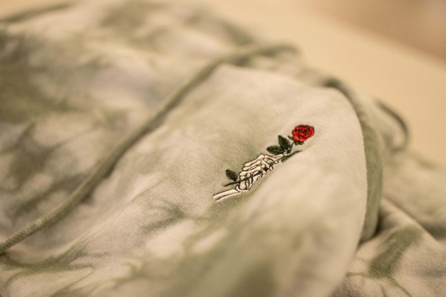 Laid out on display, an embroidered hoodie awaits a new owner at the Nothing New event.