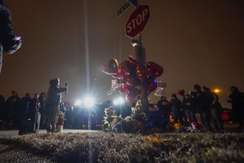 Rodney Wells, stepfather of Tyre Nichols, speaks at a prayer gathering at the site where Nichols was beaten by Memphis police officers, and later died from his injuries, in Memphis, Tenn., Monday, Jan. 30, 2023. (AP Photo/Gerald Herbert)