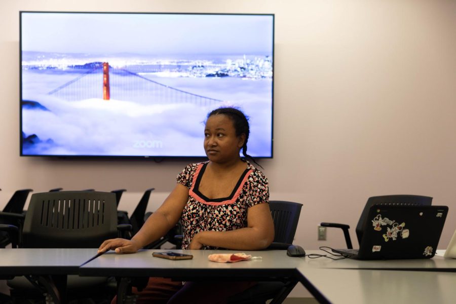 Brittany King, The Empowered Fee Fes member, an advocacy group for women with disabilities, located at 115 W. Chicago Ave., speaks with members via Zoom meeting on Feb. 6 about scheduling and enhancing their meeting repertoire.