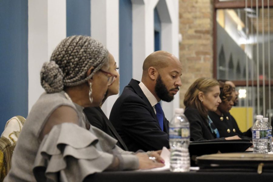 Illinois State Representative, Lamont Robinson (middle), sits before constituents of the 4th Ward on Thursday night, Feb. 9, at Grace Episcopal Church at 637 S. Dearborn St. Robinson is now running for 4th Ward alderperson. He was first elected in 2019, and represents Chicagos 5th district.