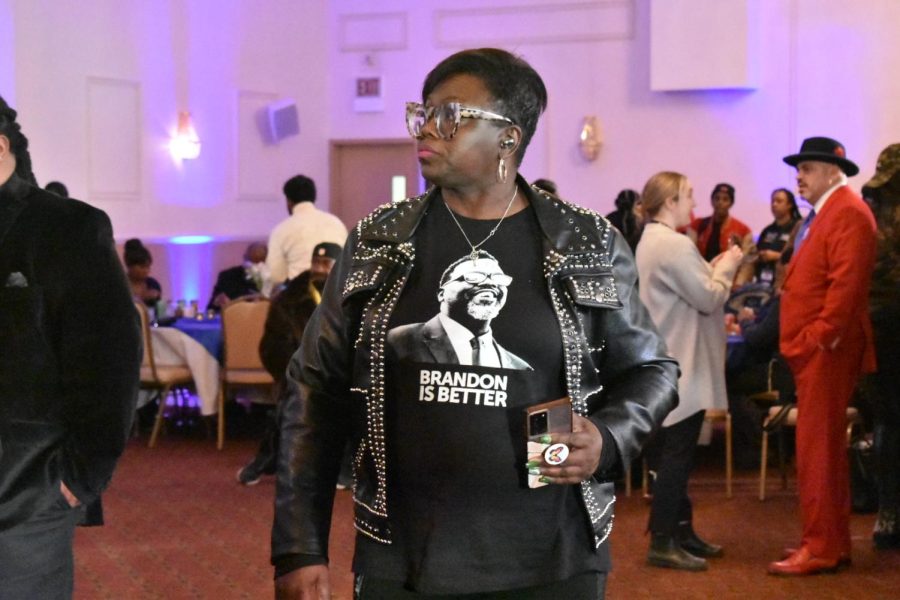  A supporter of County Board Commissioner and mayoral candidate, Brandon Johnson wanders around El Palais Bu-Sche Banquet Hall, located at 4628 W. Washington Blvd., while waiting for Johnson to speak at his election party on Feb. 28. 
