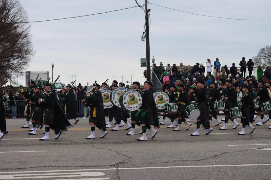 The Shannon Rovers Irish Pipe Band kick off the St. Patrick’s Day parade with an ensemble of Irish instruments on Saturday, March 11. They have been leading the parade since 1956.