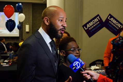 Lamont Robinson, 4th Ward aldermanic candidate, speaks to reporters in the Hyatt Hotel located at 5225 S. Harper Ave. as results showcasing his lead over his opponent Prentice Butler come in on Tuesday, April 4, 2023. Butler trailed Robinson at 30% of the votes.