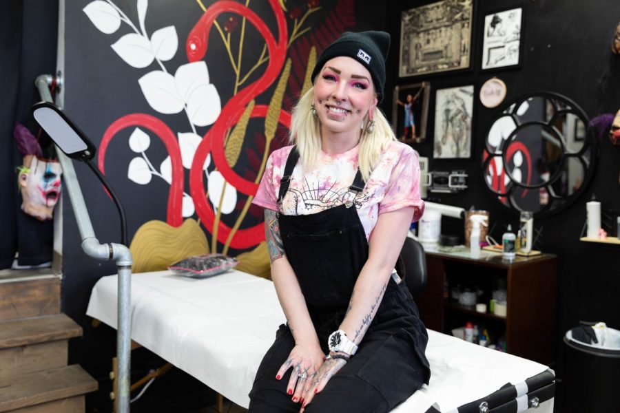 Tattoo artist Lindsey Johnson, one of the tattoo artists at Tattoo Avenue located at 5122 N. Lincoln Ave., who is participating in the flash tattoo event and fundraiser for Chicagoland Pig Rescue Johnson on Sunday, April 30, 2023, is tattooing various flash designs with pigs.