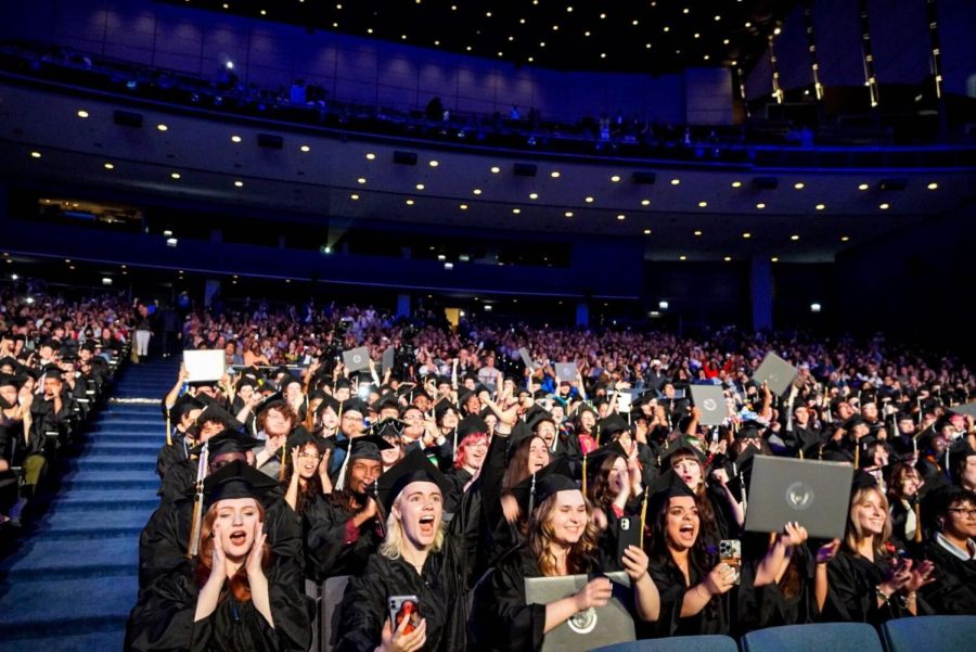 Columbia students cheer in celebration of graduating on Sunday, May 14, 2023, at the Arie Crown Theatre, located at 2301 S. Baptiste Point DuSable Lake Shore Dr. The Sunday ceremony included students from Design, Music, Art and Art History, and Interactive Arts and Media departments. 