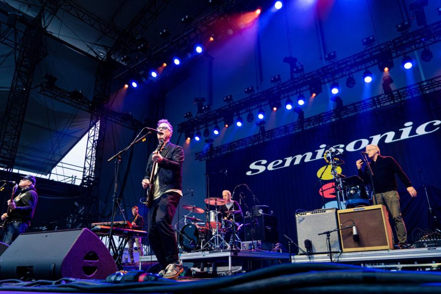 Semisonic performs their song Singing in My Sleep from their album Feeling Strangely Fine at Huntington Bank Pavilion on Northerly Island 1300 S Linn White Dr, on Tuesday, June 6, 2023. John Munson, far left, Dan Wilson, center left, and Jacob Slichter, back on the drums, are the bands three original members.