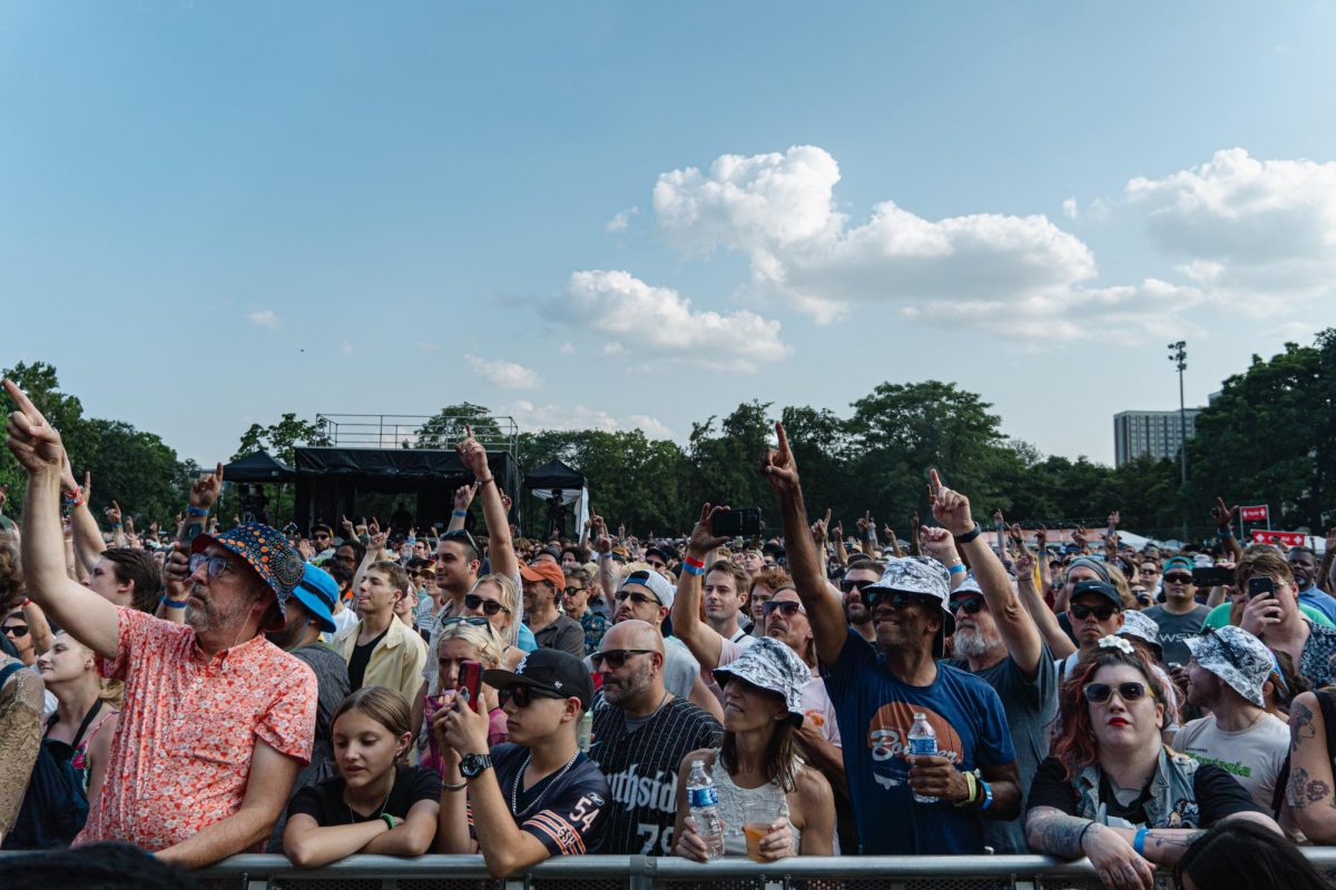 Fans of rapper, Killer Mike, display joy as he engages with the crowd at Pitchfork in Union Park on Sunday, July 23, 2023. Considered one of the most crowded music festivals in the country, Pitchfork hosts 40 plus artists and tens of thousands of music lovers.