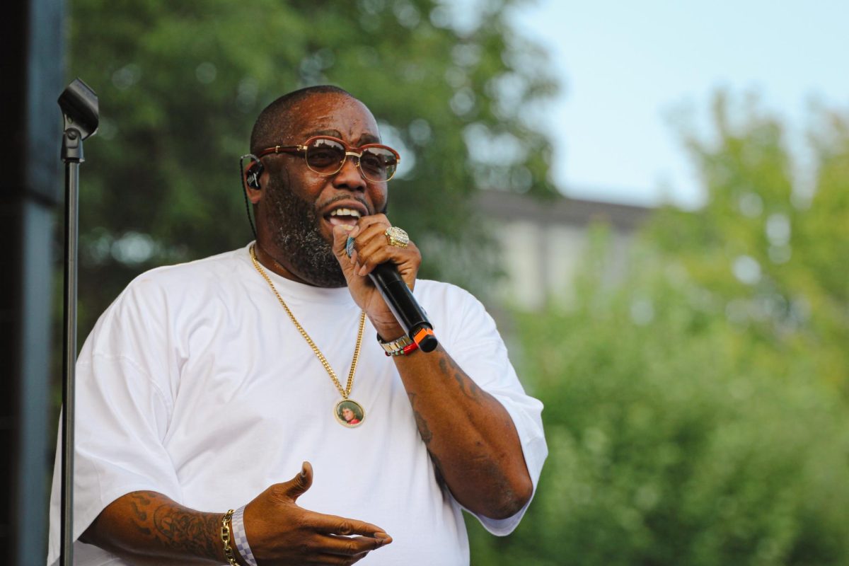 Michael Santiago Render, known by his stage name Killer Mike, preaches to the crowd at Pitchfork Music Festival in Union Park on Sunday, July 23, 2023. Alongside Killer Mike, the rapper had a gospel group singing behind him.