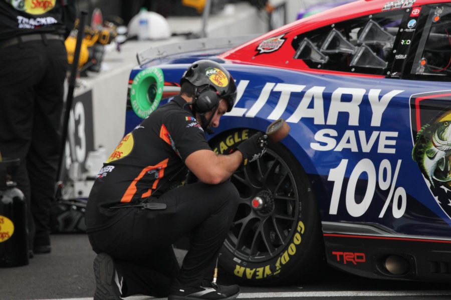 Pit crew member attends to car #19 for Joe Gibbs Racing for the XFinity Loop 121 Chicago Street Course Race on July 1, 2023.  