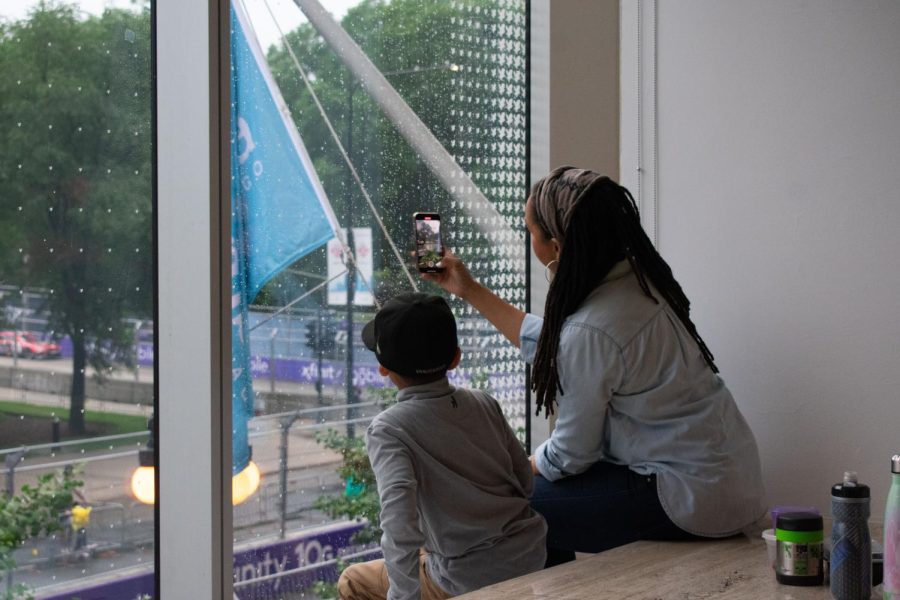 Meredith and Emory Sutton both watch the NASCAR Chicago Street Race in downtown Chicago on Sunday, July 2, 2023. Columbia hosted an Exclusive Viewing Party at 618 S. Michigan Avenue.