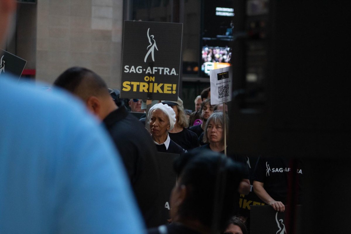 SAG-AFTRA strikers listen as a speech is being made at a protest at Daley Plaza at 50 W. Washington St. on Friday, Aug. 4, 2023.  