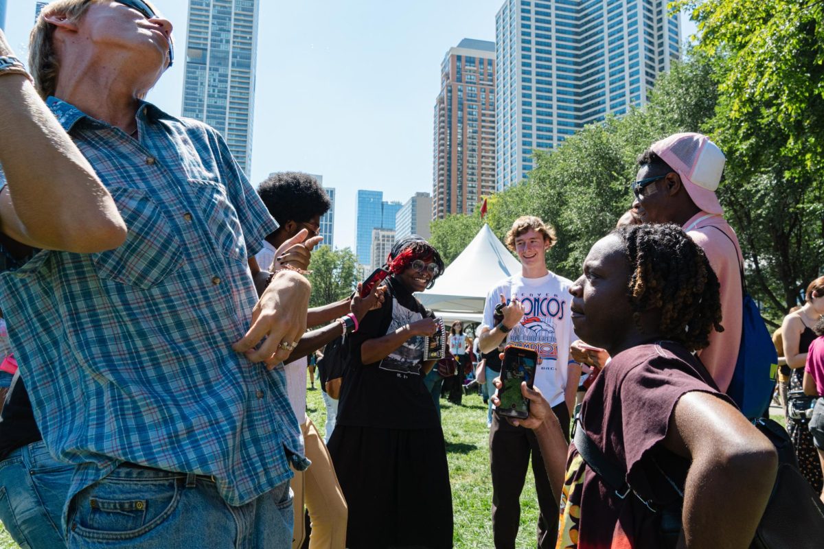 Dancing ensues as DJ beats fill the air at Columbia Convocation in Grant Park on Friday, Sep 1, 2023. Live bands, freebies, food and more are all found at the annual event.