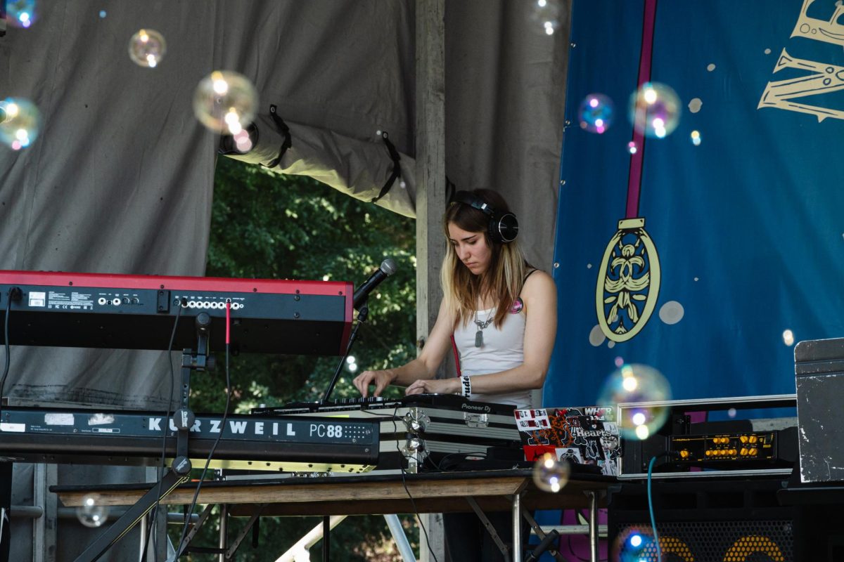 Columbia student and musician, PROXOXIE, kicks off the sounds at Columbia Convocation while DJing in Grant Park on Friday, Sep 1, 2023. Following their set, Columbia