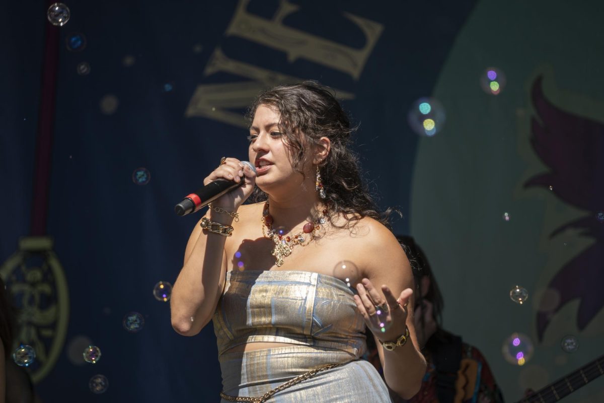 Tanya Guerrero sings alongside her band on stage at Convocation in Grant Park on Friday, Sep. 1st, 2023.