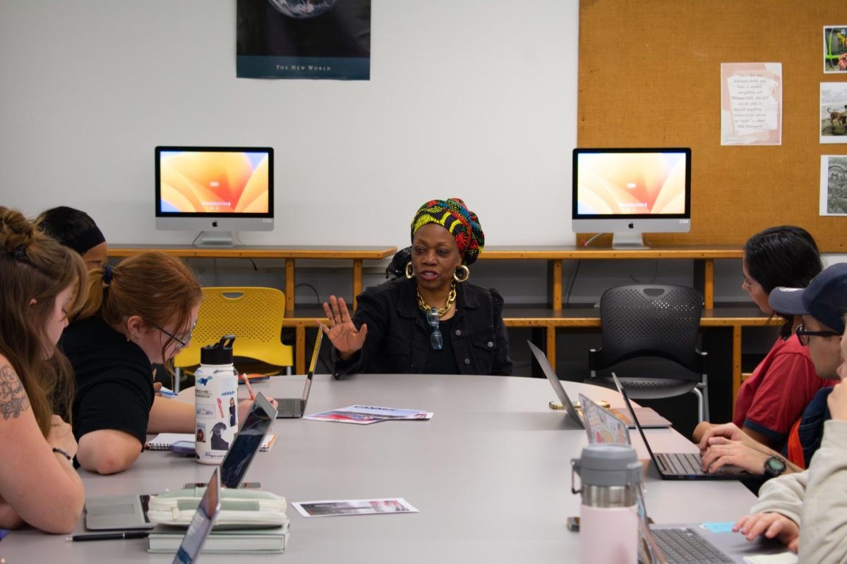 Regina Taylor talks with students about the project with Columbia College Chicago called Black Album Mixtapes, at 33 E. Ida B. Wells Dr., on Monday, Sept. 18, 2023. Taylor shares with students about the conversation that she hopes to spark when highlighting issues of representation.