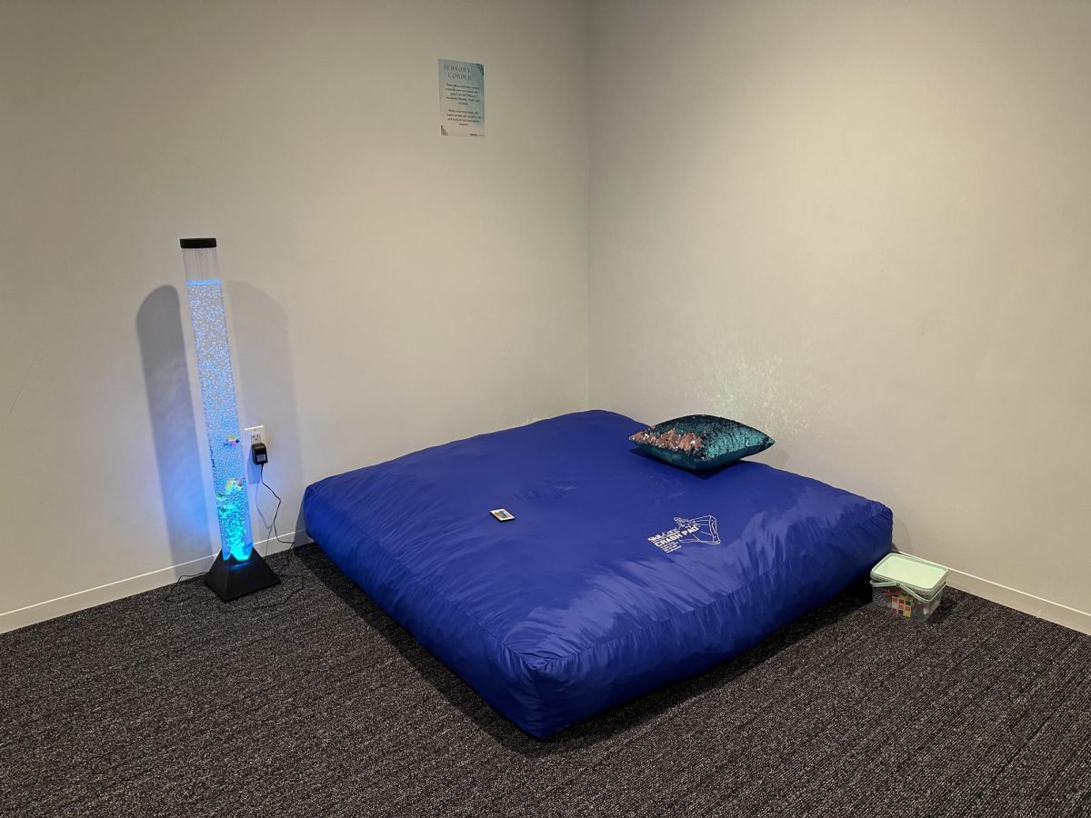 The Sensory Room, located in the back of the Reflection Space on the fourth floor of the Student Center, has open space for meditation, on Sept. 21, 2023. The space includes a pallet to lie on, a lamp and pillows for students to use. 