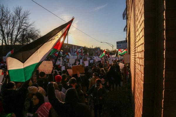 Protestors gather outside on Thursday Nov. 9, 2023 near 401 N. Armour St to show their disapproval of how Biden and his administration are spending aid and money to Israel amid the war in Gaza.
