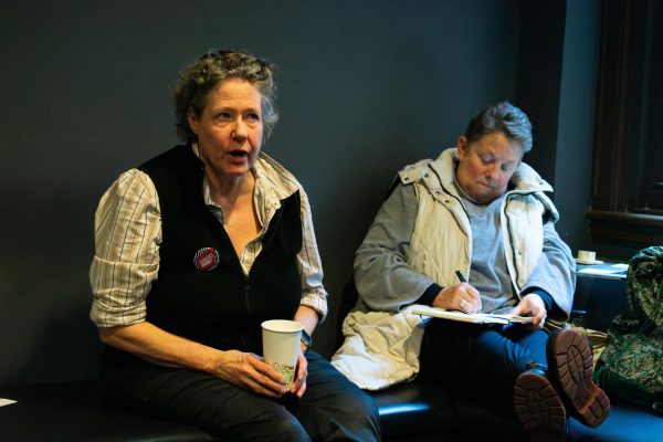 AAUP President Joan Giroux, a professor in the Art and Art History Department, sits with Dana Connell, an associate professor in Fashion Studies, during a meeting in the 623 S. Wabash building on Friday, Nov. 17, 2023. Faculty met to discuss their workload and shared governance during the strike.