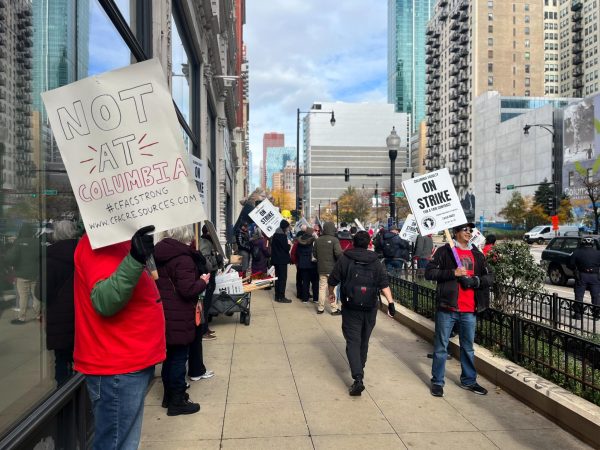 Part-time faculty and students march outside 1104 S. Wabash Ave. to protest the administrations labor practices on Wednesday, Nov. 1, 2023. This marks the third day of the strike and its expected for the strike to continue throughout the rest of the week.