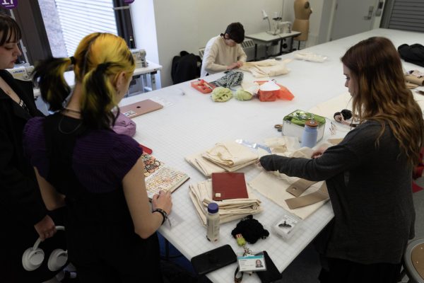 Students work on various projects in the Fashion Lab located at 623 S. Wabash Ave. on Feb 22, 2024. Many students within the fashion department are worried about hours in the Fashion Lab getting reduced due to the deficit.
