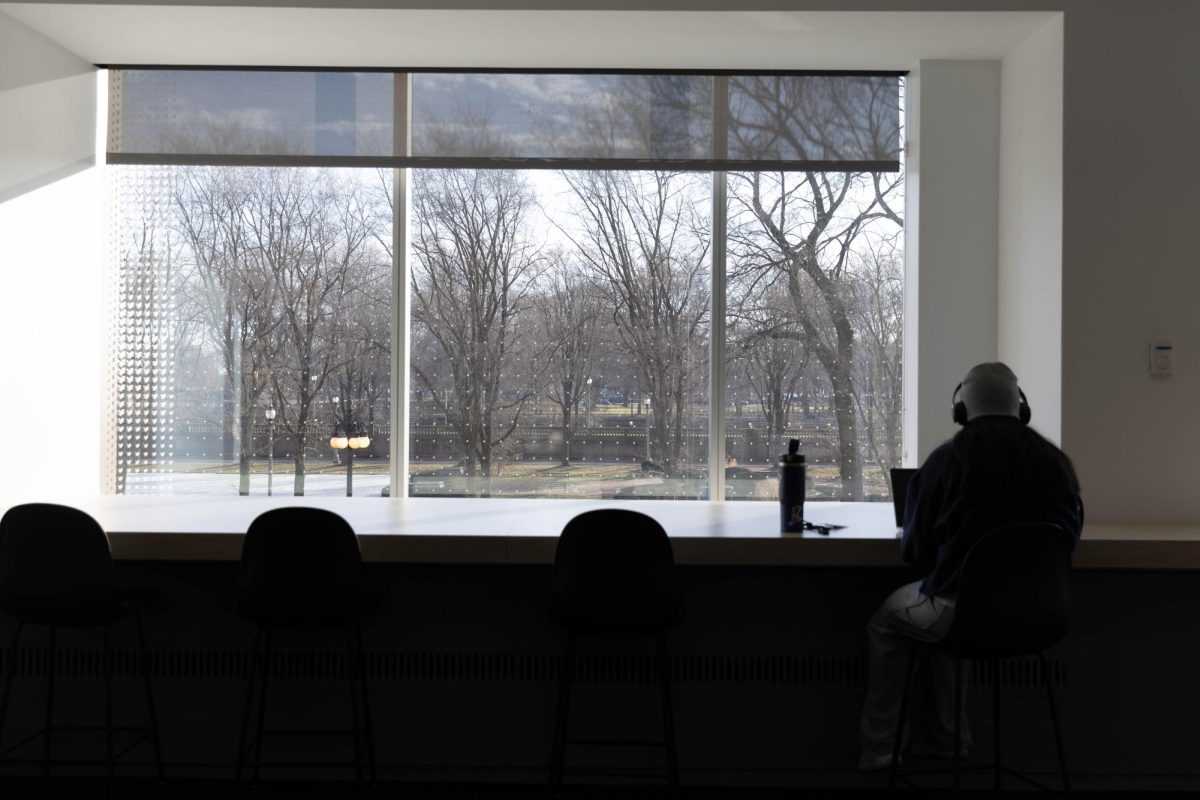 A student studies before classes begin at 9:00 on Thursday, Feb. 8, 2024 at 618 S.Michigan Ave.