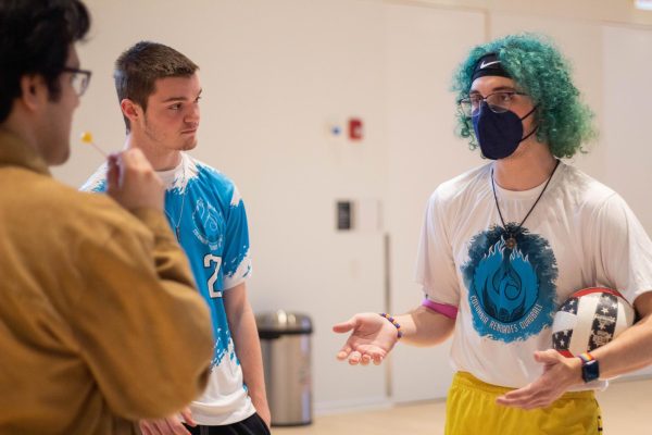 Quadball captains, Brady Charles and Maverick Wolf explain quadball to interested students during SOC Block Party event, on Wednesday, Feb. 21, 2024.