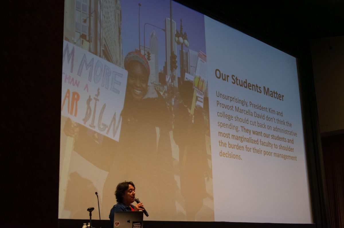 President+of+the+Faculty+Union+Diana+Vallera+speaks+at+The+Real+Town+Hall+on+Oct.+20%2C+2023.+Various+slides+were+used+to+inform+students+and+faculty+about+issues+affecting+Columbia+College+Chicago.