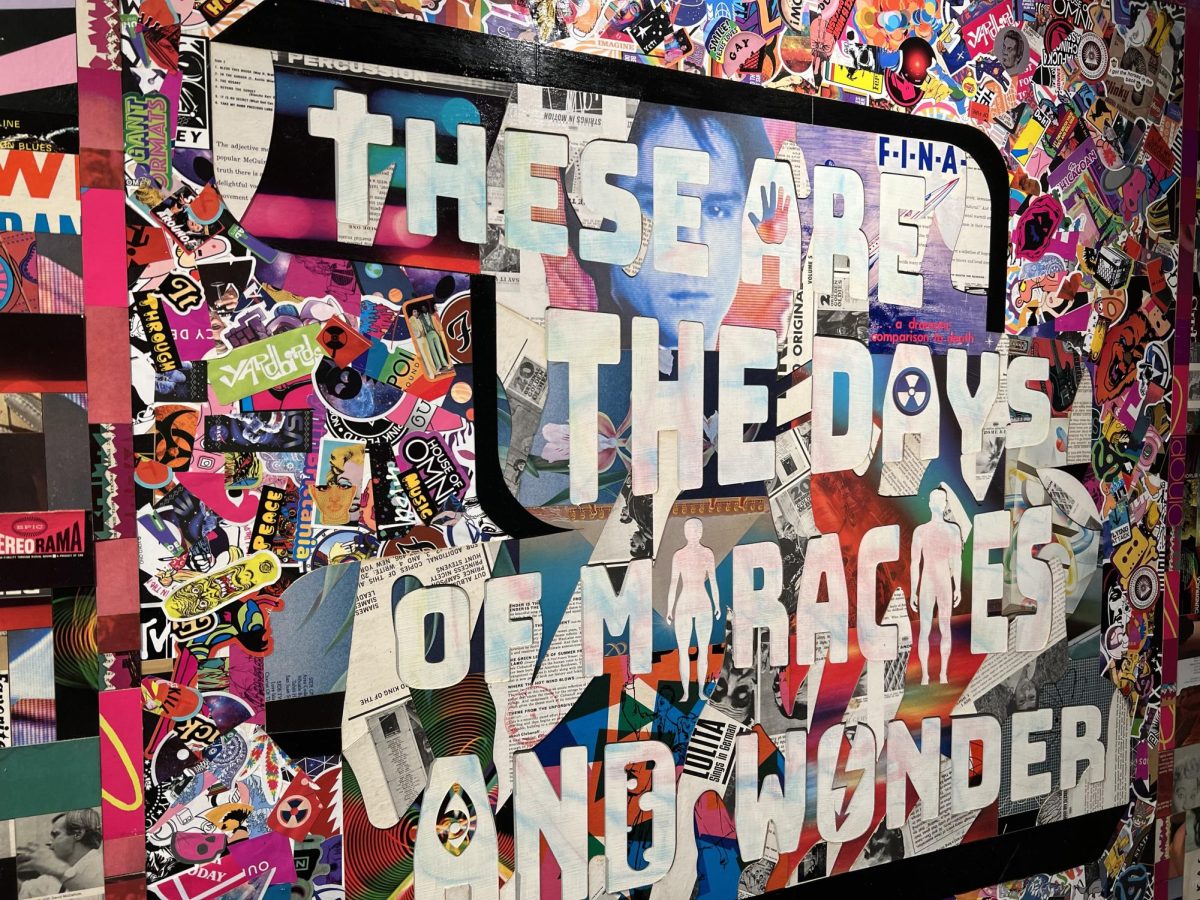 One of Tom Eslinger’s pieces displayed at the Center on Halsted on Feb. 15, 2024, reads “these are the days of miracles and wonder,” atop a contrast of bright and detailed stickers