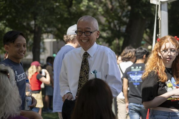 President and CEO Kwang-Wu Kim speaks with students at convocation in Grant Park on Sep. 1, 2023. Kim, who announced in February that he plans to step down in July, told the Chronicle that he had already started to think about leaving last summer. 
