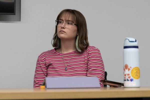 Jenna Davis, candidate to be the next  Student Government Association president, sits in a meeting with President and CEO Kwang-Wu Kim on Feb. 13, 2024. 