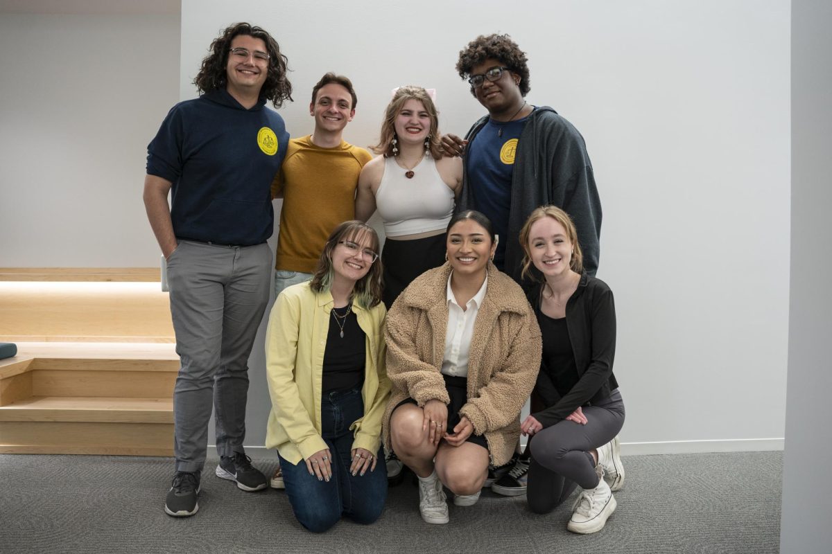 Current Student Government Association E-Board members pose for a photo with the newly elected at the 618 S. Michigan Ave building on Tuesday, April 9, 2024.