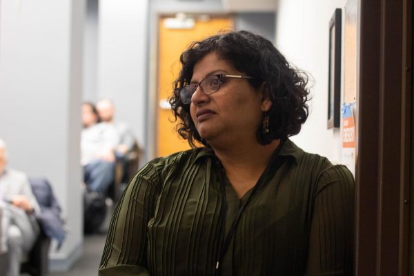 Faculty Senate President Madhurima Chakraborty at the Faculty Senate town hall, in Hokin Hall, on Friday, March 1, 2024. During the meeting she raised concern for where cuts might lie as plans to close the deficit are brought up.