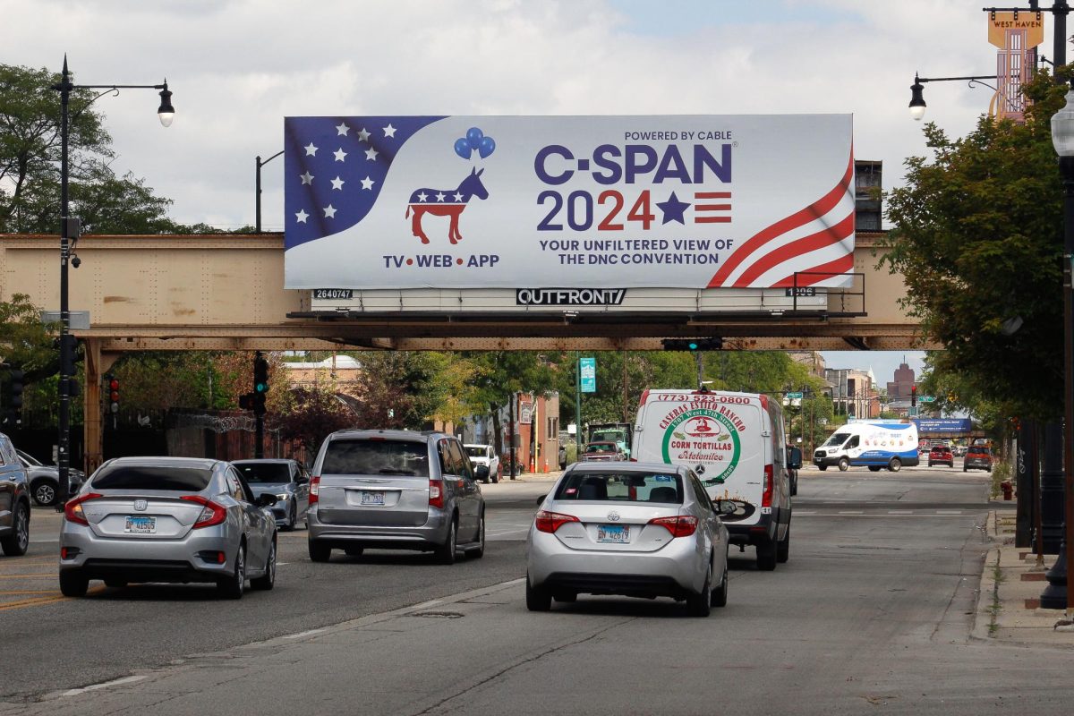 In Pilsen, Chicago a billboard displays information on how to view the DNC from TV, online, or by app. Aug. 20, 2024