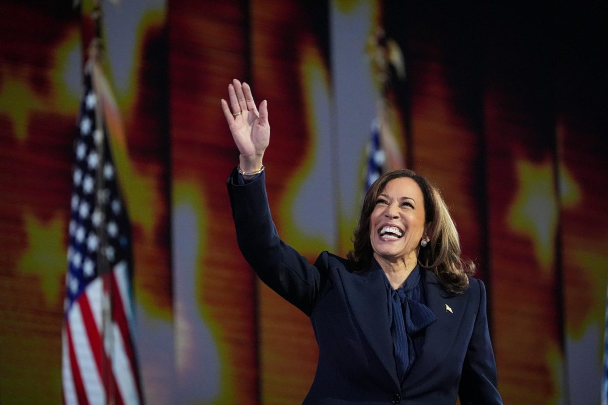 U.S. Vice President Kamala Harris waves to the crowd before delivering her speech accepting her nomination for presidency at the Democratic National Convention at the United Center in Chicago on Thursday, Aug. 22, 2024.