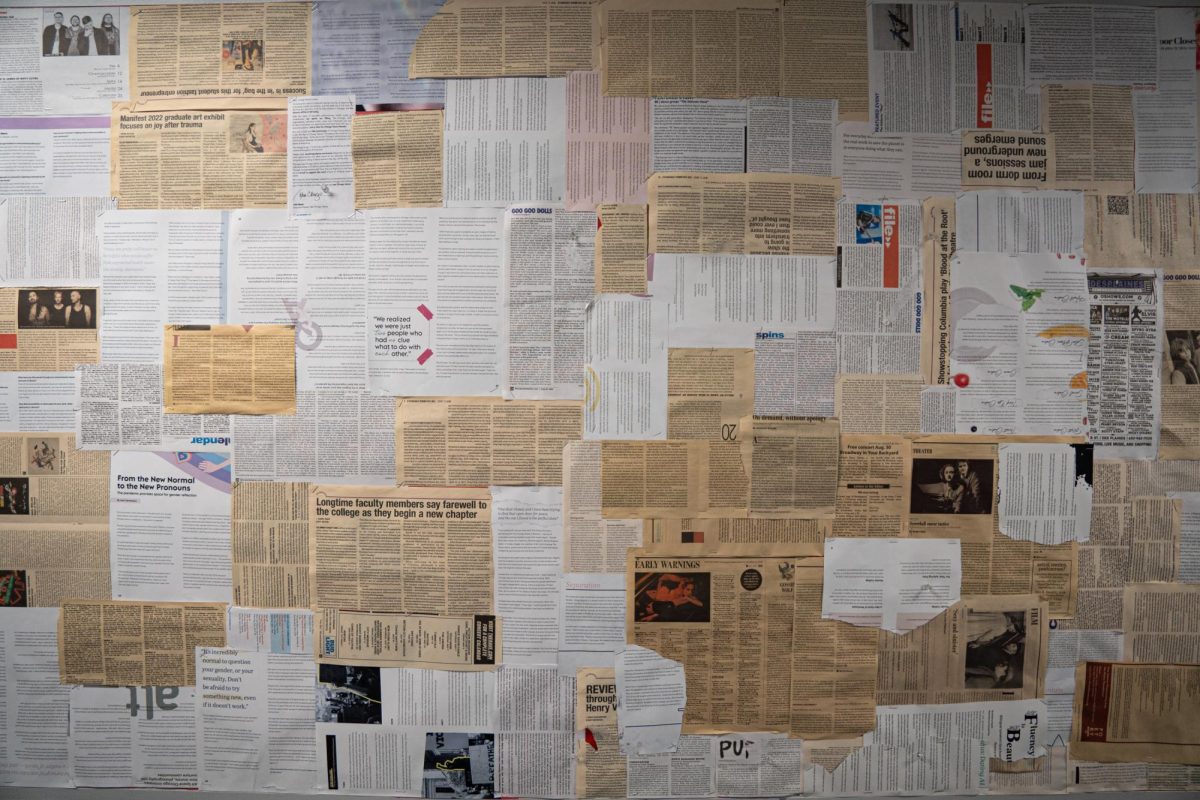 A bulletin board compiled of scrapped newspapers on the wall in the English and Creative Writing Department on the fifth floor of the 33 E. Ida B. Wells Drive building on Thursday, Aug. 8, 2024.