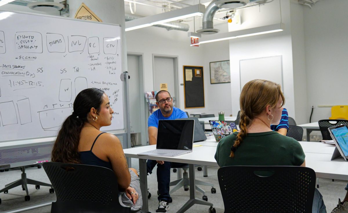 Bilingual Faculty Advisor for the Columbia Chronicle Fernando Diaz meeting with the Chronicle team to discuss plans for the upcoming semester on Aug. 28, 2024.