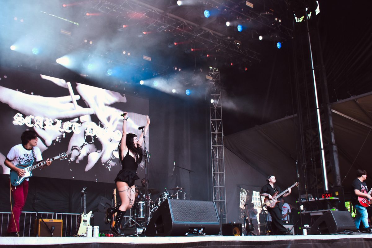 Scarlet Demore performs at the Bacardi stage on the fourth day of Lollapalooza in Grant Park. The band rocks out on stage on Sunday, Aug. 4, 2024.