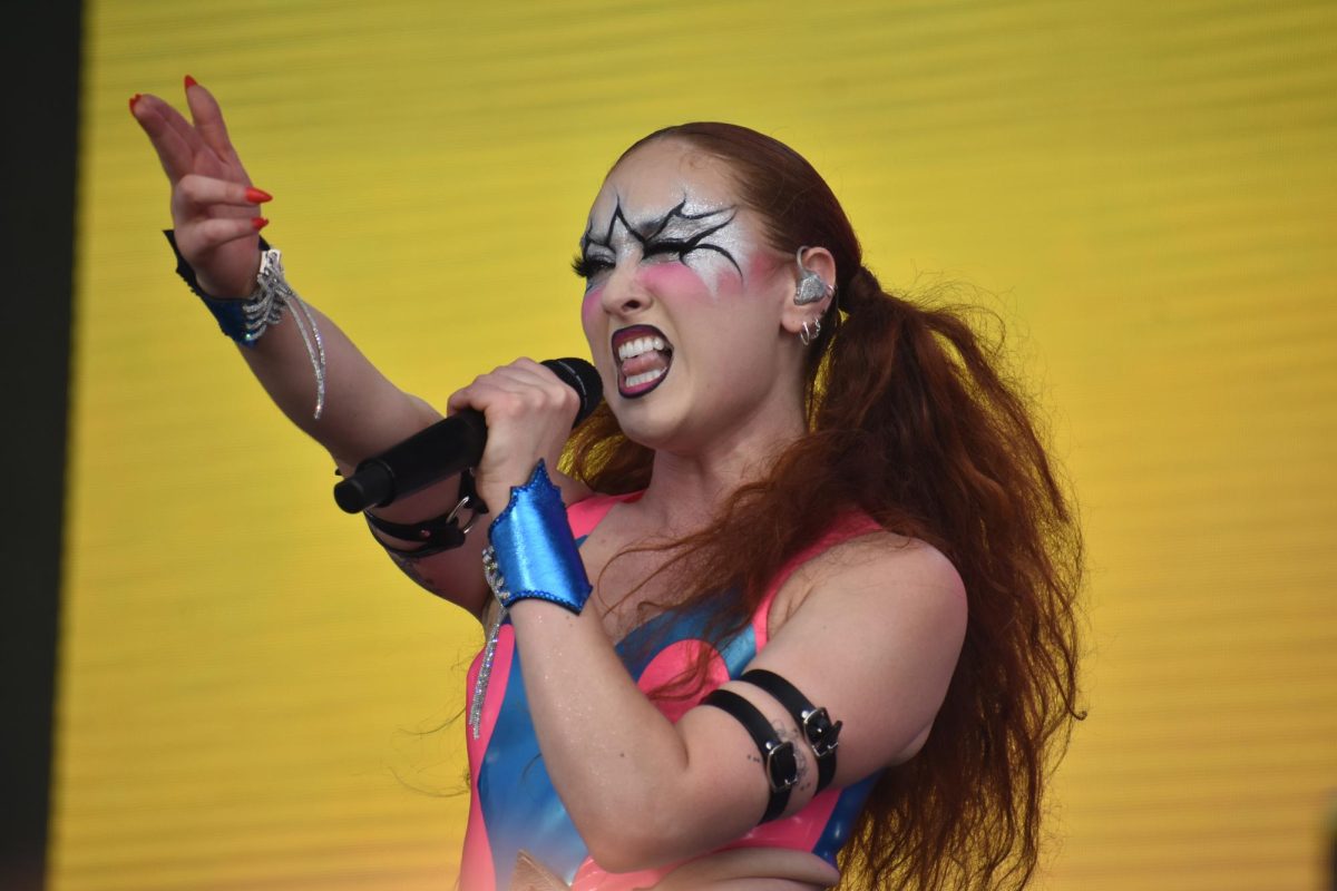 Chappell Roan performs on the T-Mobile state in Grant Park at Lollapalooza on Thursday, Aug. 1, 2024. Fans scream in excitement as she walks onto the stage.