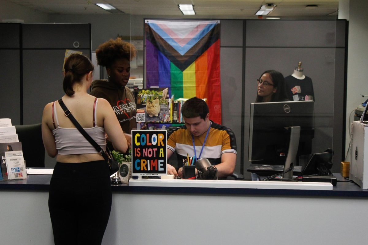 Students get the help they need for the start of the semester from the library staff at the 624 S. Michigan Ave. building on Sept. 5, 2024