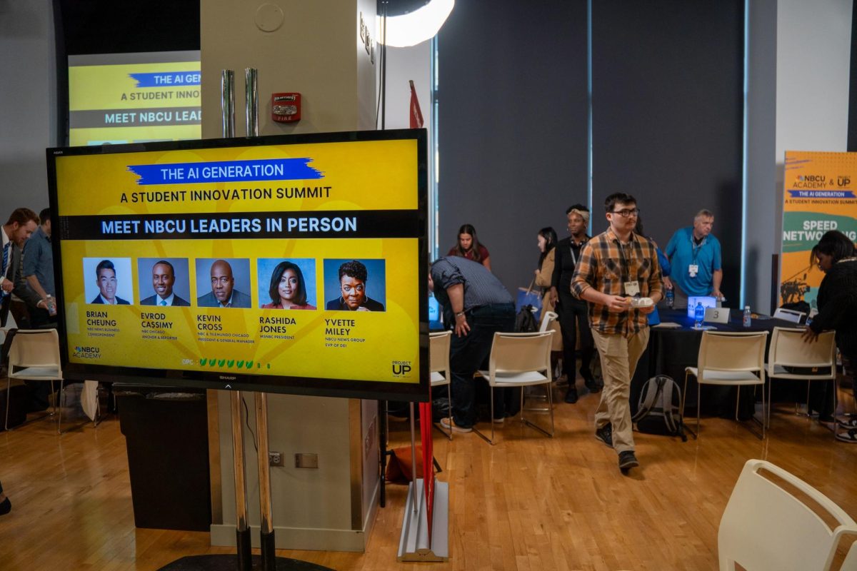 Attendees mingle at the NBCU Academy AI summit start time in the Conaway Center at 1104 S. Wabash Ave on Wednesday, Sept. 25, 2024.