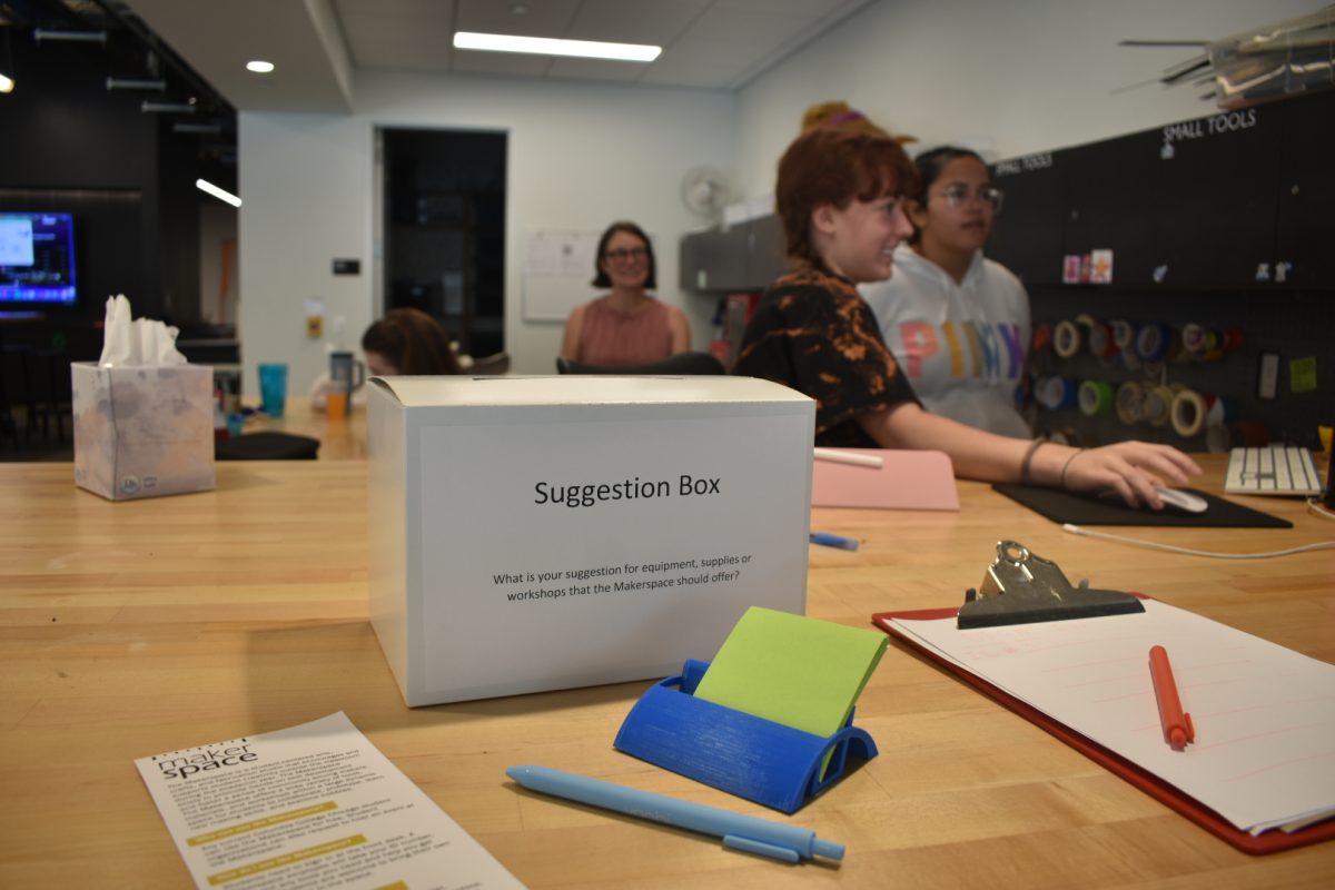 Makerspace employees display a new suggestion box on the second floor of the Student Center on Wednesday, Sept. 18, 2024.