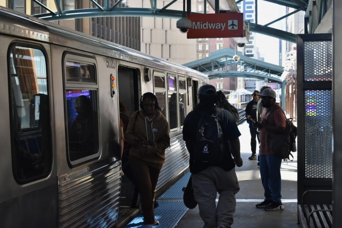 Chicago students board the orange line train at Harold Washington Library train stop on Tuesday, Sept. 10, 2024.