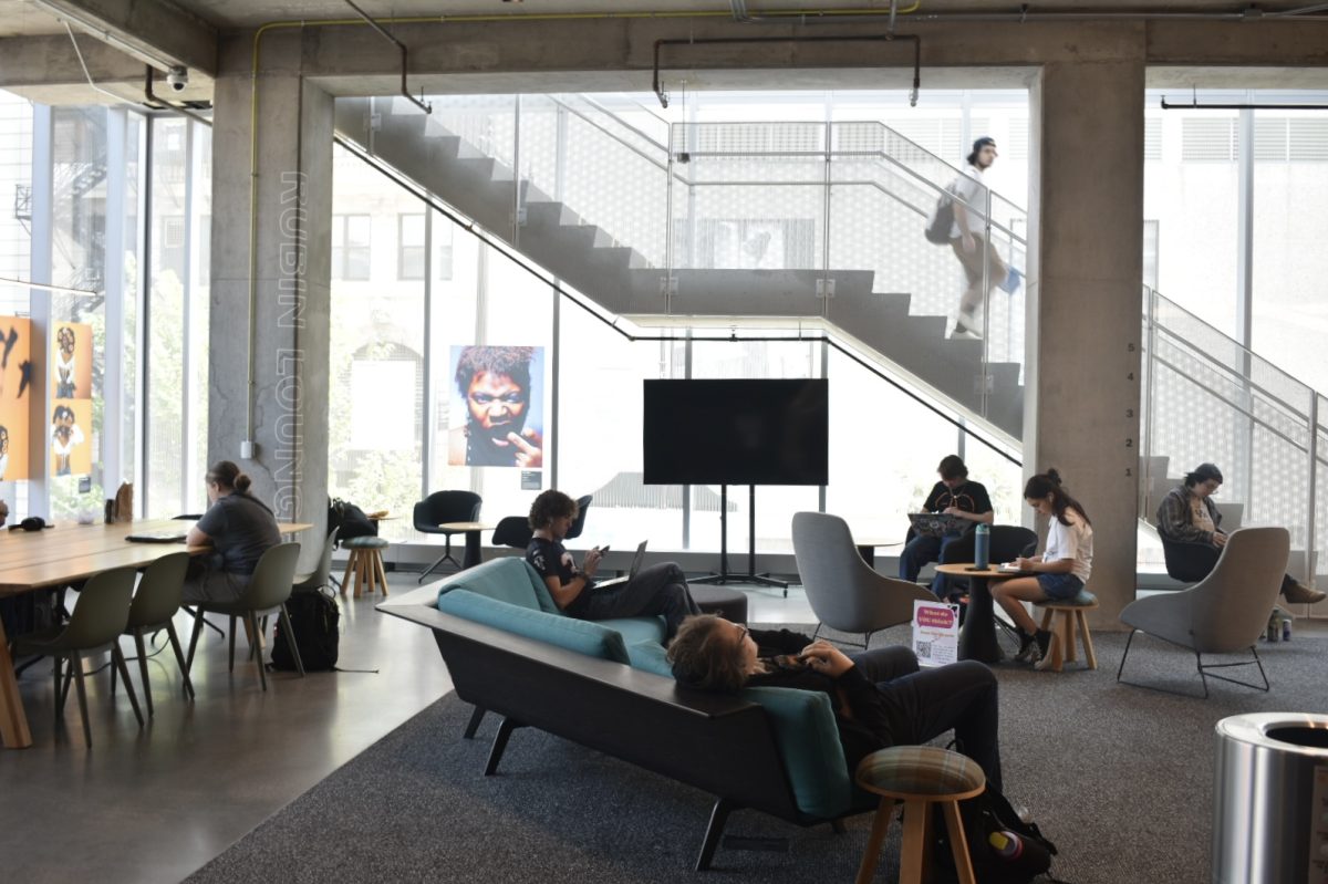 Students talk in the student center about recent programs cut at Columbia on Thursday, Sept. 12, 2024. Students work on current assignments and project as they finish up the second week of classes.