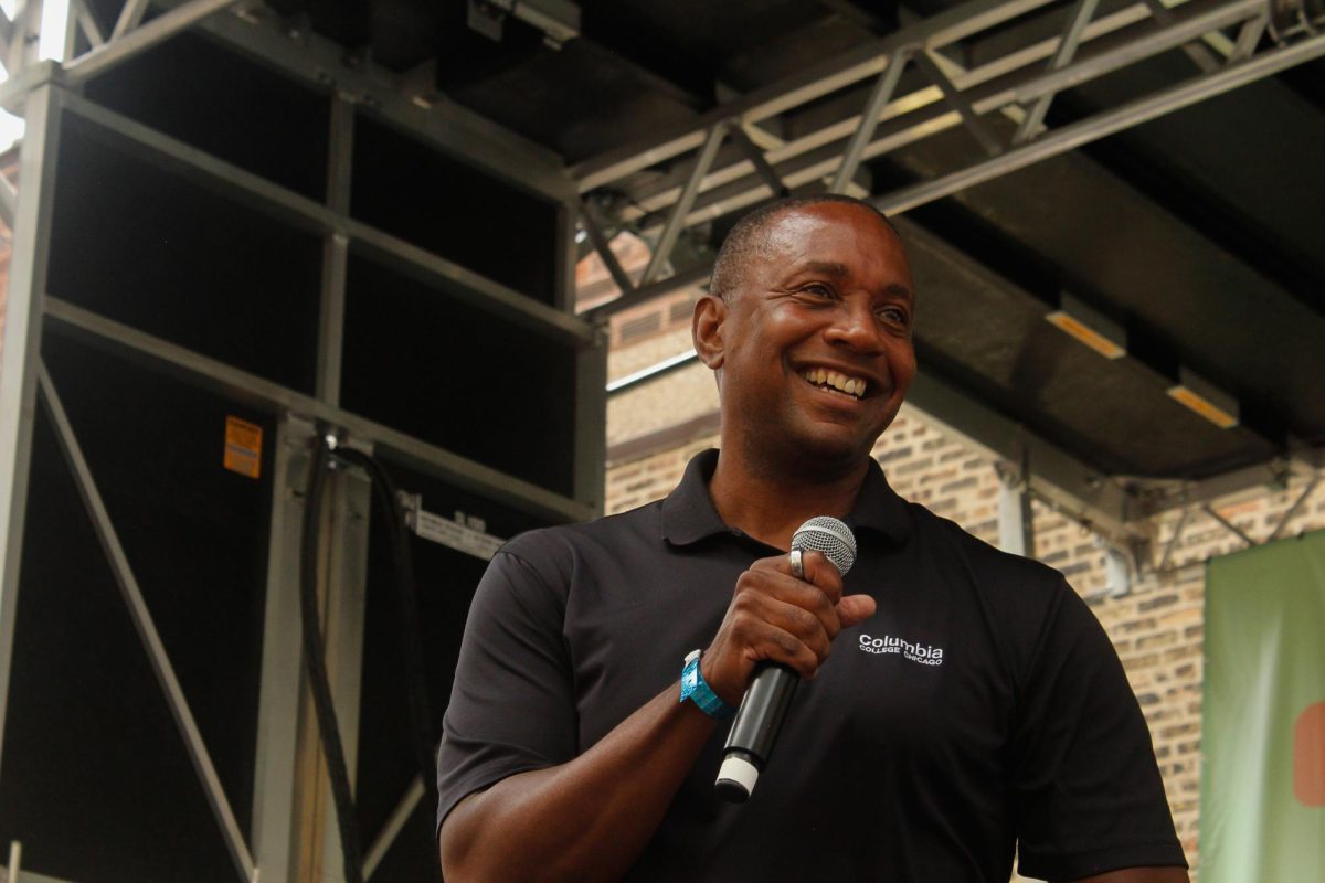 Interim President and CEO Jerry Tarrer speaks in front of incoming Columbia first-year and transfer students at the New Student Convocation at the Student Center parking lot on Friday, Aug. 30, 2024.