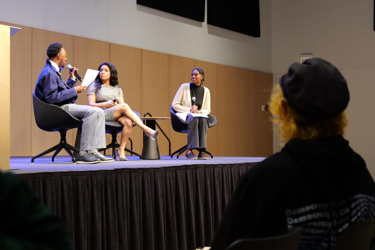 Columbia Alumni Precious Brady-Davis, who is the first Black openly trans woman to hold public office in Cook County, is interviewed by “voter registration geniuses” Jaylen Barlow and Eryn Young during the "Rev Up the Vote" event held in the event space of the Student Center on Wednesday, Oct. 9, 2024. 