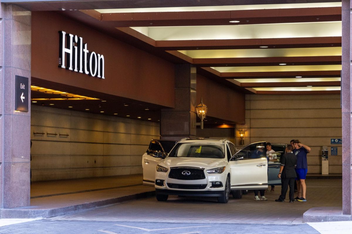 Patrons checking in with valet outside of the Hilton at 720 S. MIchigan Ave., Sept. 25, 2024. The Hilton has started to phase out single use bottles in exchange for refillable toiletry bottles in bathrooms.