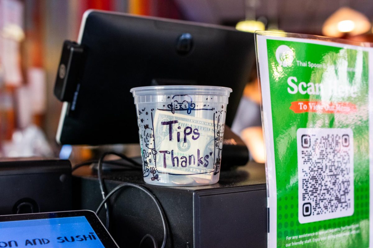 Tip jar at popular South Loop restaurant Thai Spoon and Sushi at 601 S. Wabash Ave. on Wednesday, Oct. 23, 2024.