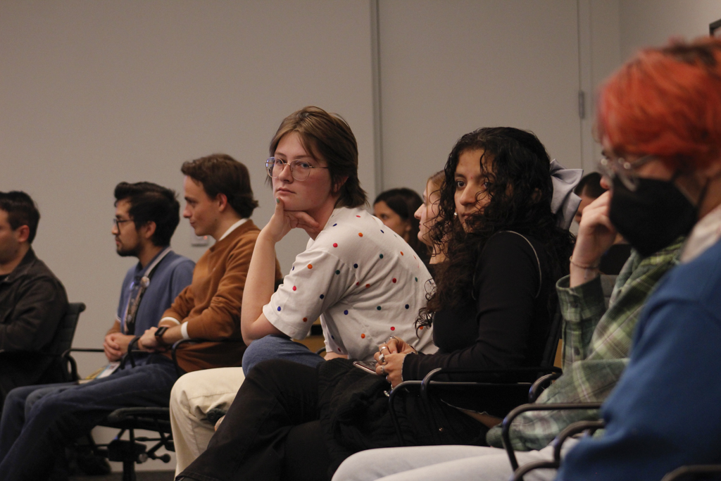 Students listen in to others questions at the SGA meeting featuring the interim president Jerry Tarrer on Oct. 15, 2024