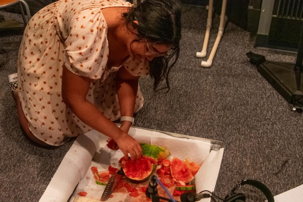 Dash Mangrulkar, a first-year musical theater major, participates in Horror Movie Foley Night hosted by the Women in Audio club on Oct. 21, 2024, at 1104 S. Wabash Ave.